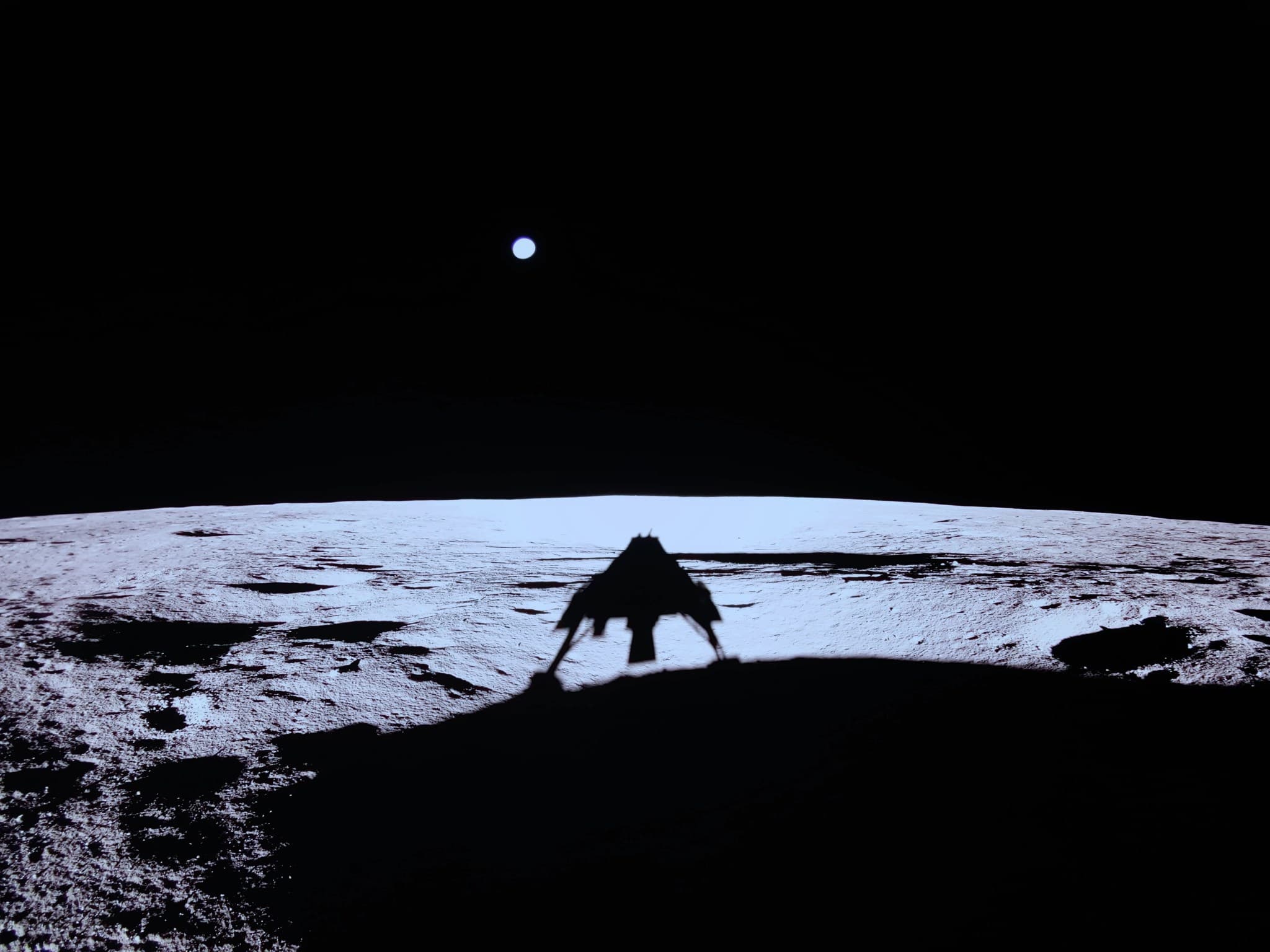 Firefly's Blue Ghost lunar lander casting a shadow on the Moon after landing.